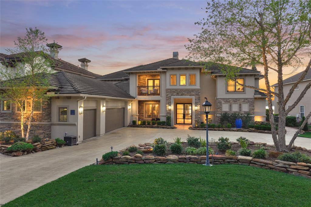 Embrace the beauty and quality of this completely updated lake front home that has a professionally landscaped exterior.