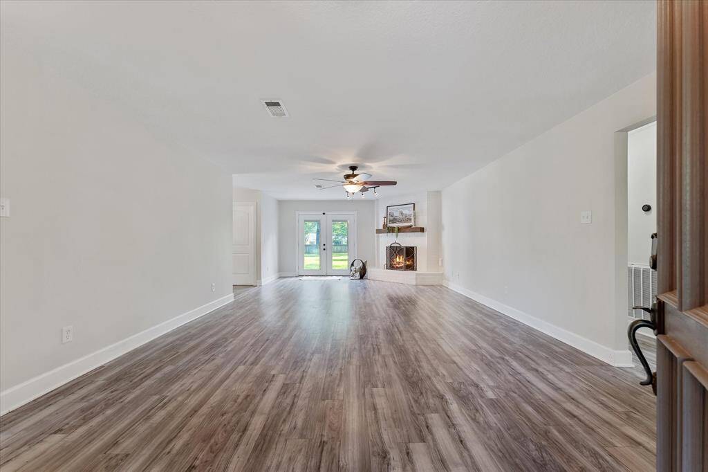 Expansive living area with seamless access to the back patio.