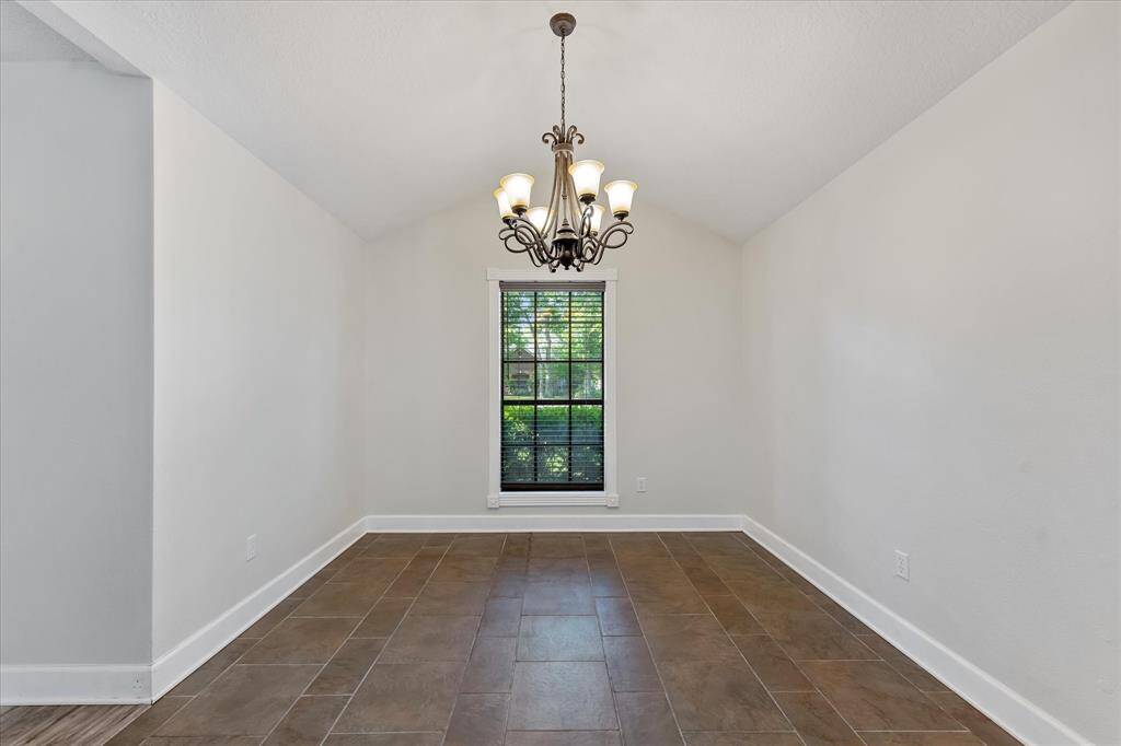 Charming dining area seamlessly connected to the living room and kitchen.