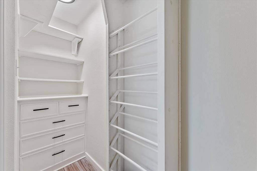 Elegant built-in dresser with a convenient shoe tower for organized storage.