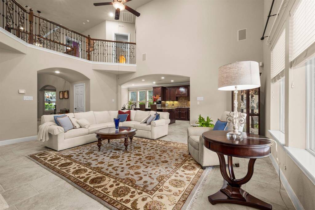 Seamless flow to kitchen and breakfast area for effortless entertaining.