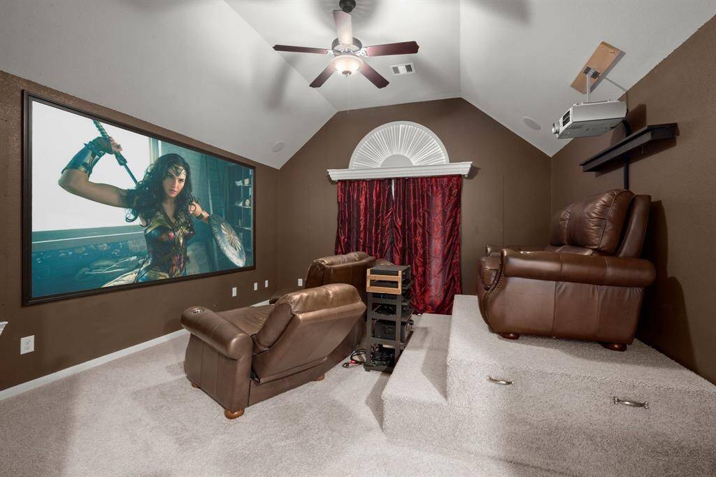 Movie night ready—dark, cozy, and inviting.Built-in surround sound for an immersive experience.