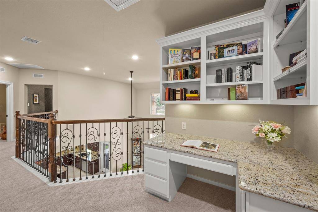 Built-in desk just off of the stairs to create a warm and inviting place for the children to do homework or mom to work on crafts.