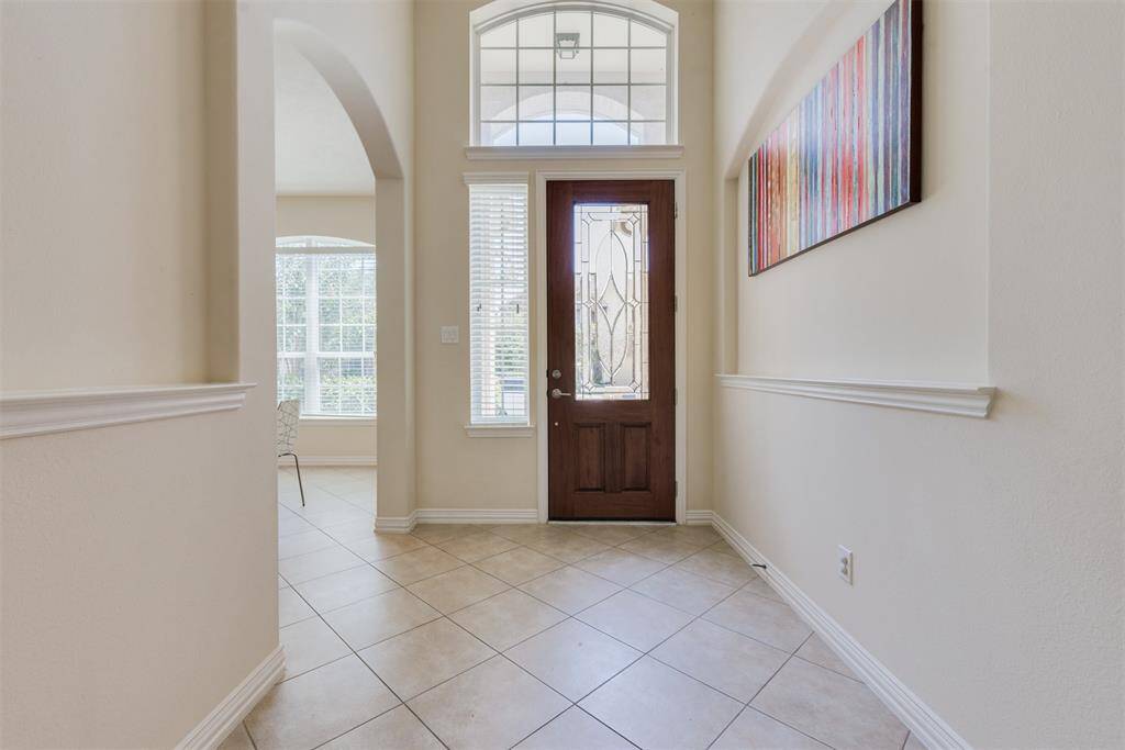 The entry way opens up to the living and dining area.