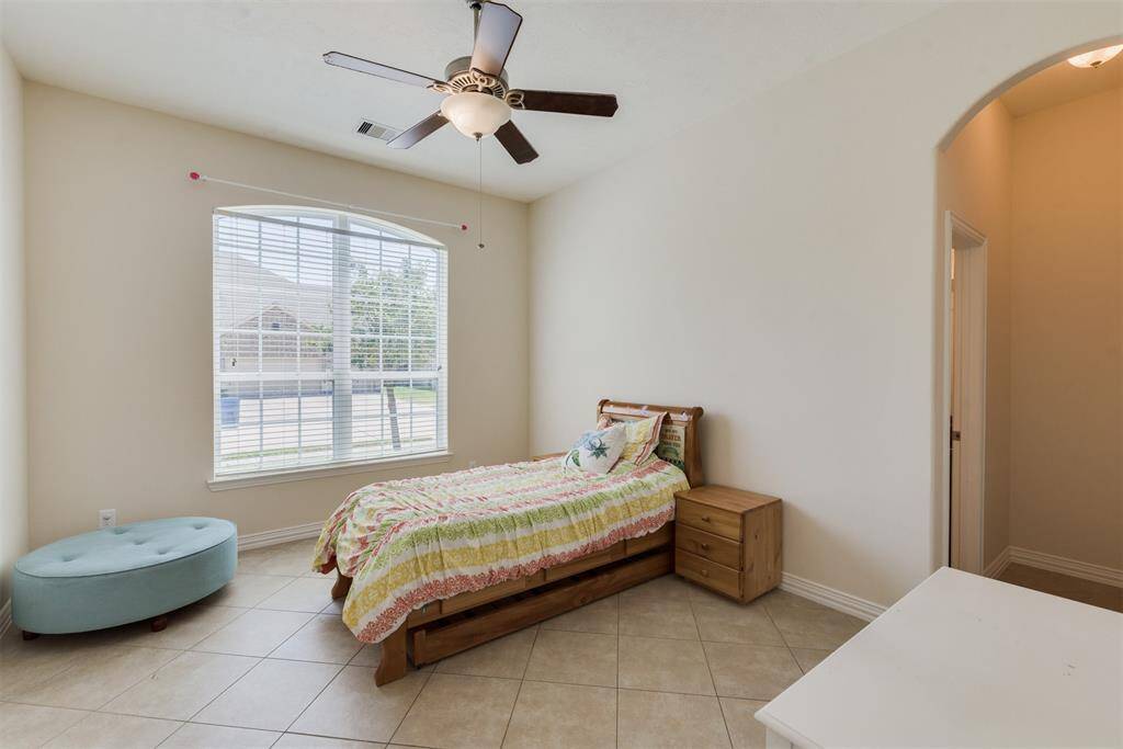 View of the third bedroom includes en suite full bath.