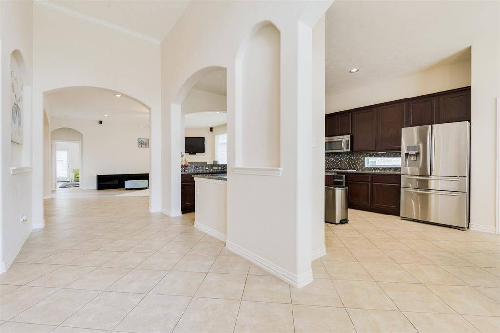 A charming bright and open floor-plan concept was in mind when this home was built. This is the perfect home for hosting.