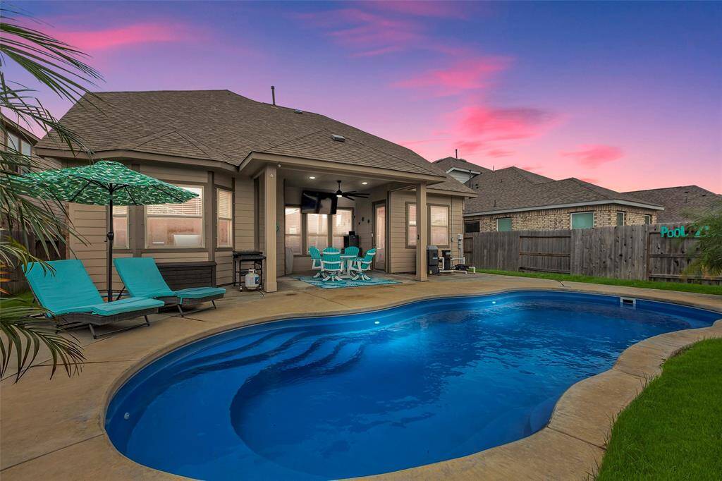 Welcome to 2510 Ocean Key Dr, where you can unwind in this heated and cooled pool!