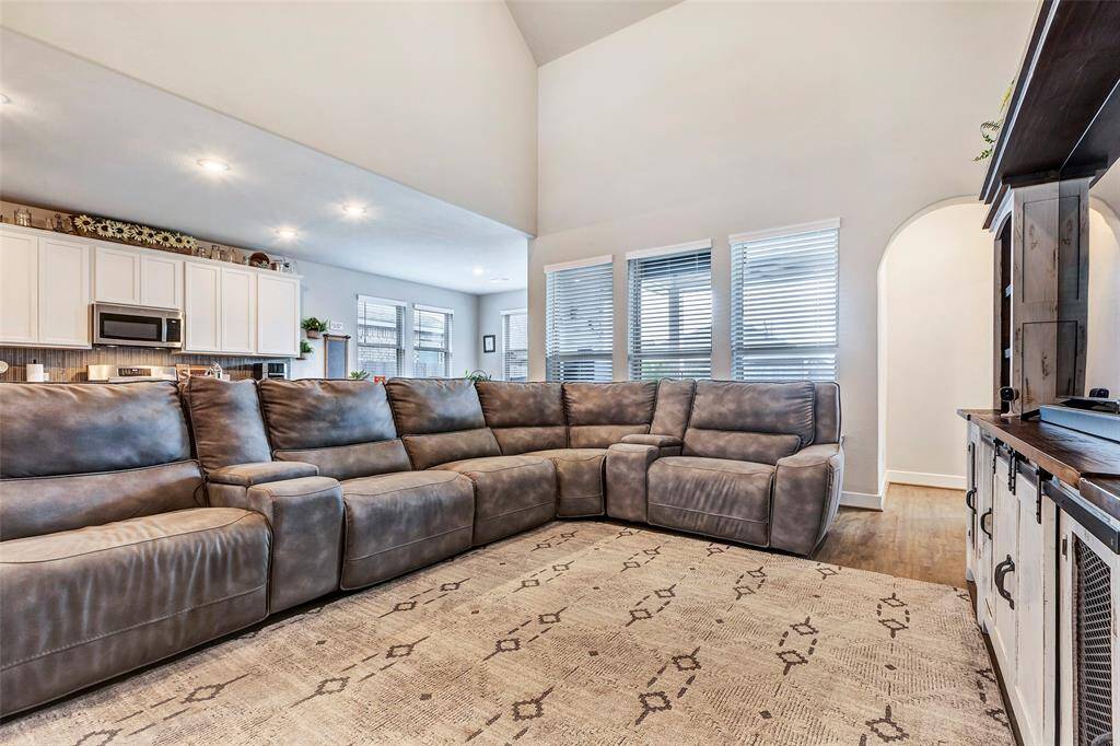 Just behind the living room, this spacious kitchen offers a seamless transition from relaxation to culinary creativity.