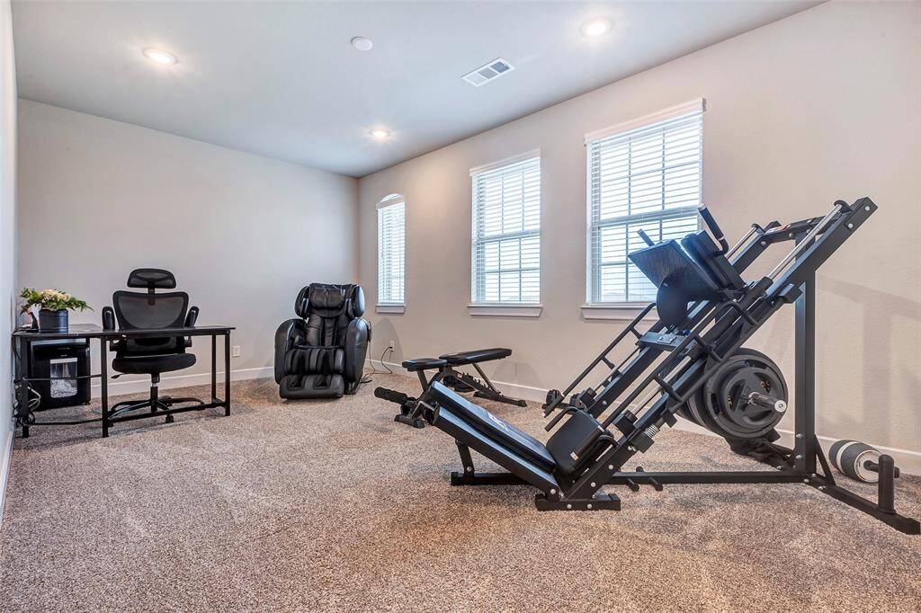 Transform this versatile room on the second floor into your perfect living space or game room.