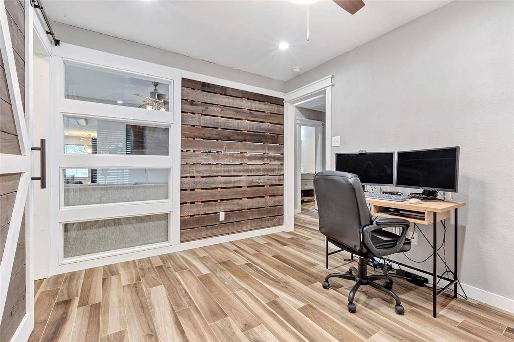 This additional view of the versatile room highlights its spaciousness and adaptability.
