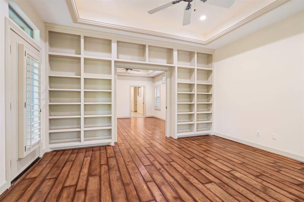 Sunroom has built-in bookcases as well and can be an additional study on the first floor if desired.