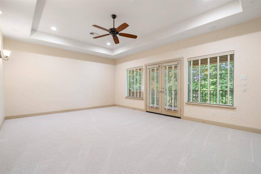 Upstairs game room has French Doors leading you to a beautiful balcony overlooking the golf course. Brand new carpeting just installed April 2025.