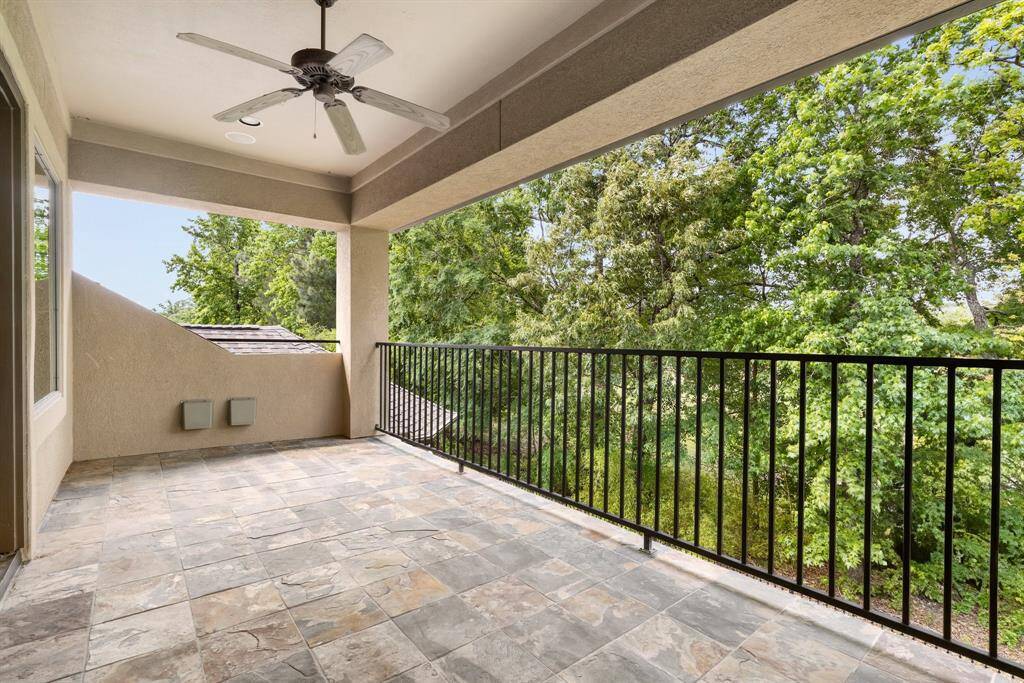View of the private upstairs balcony located off of the game room.
