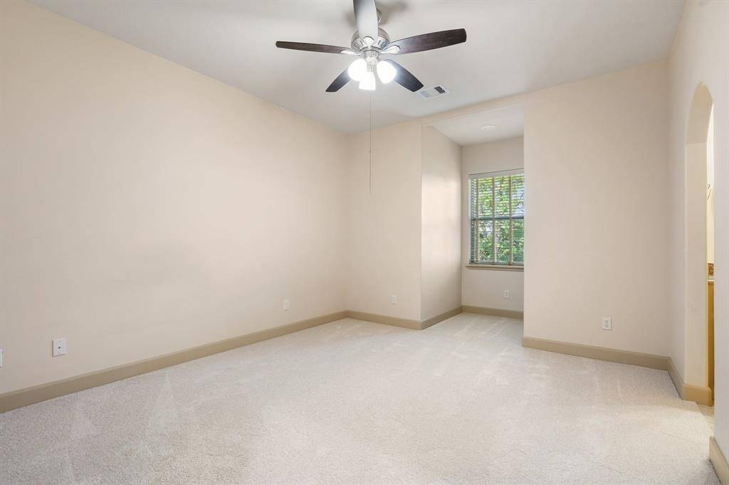 One of two secondary upstairs bedrooms. Has a jack-n-jill bathroom with private sink. Brand new carpeting in upstairs bedrooms and game room. Installed April 2025.