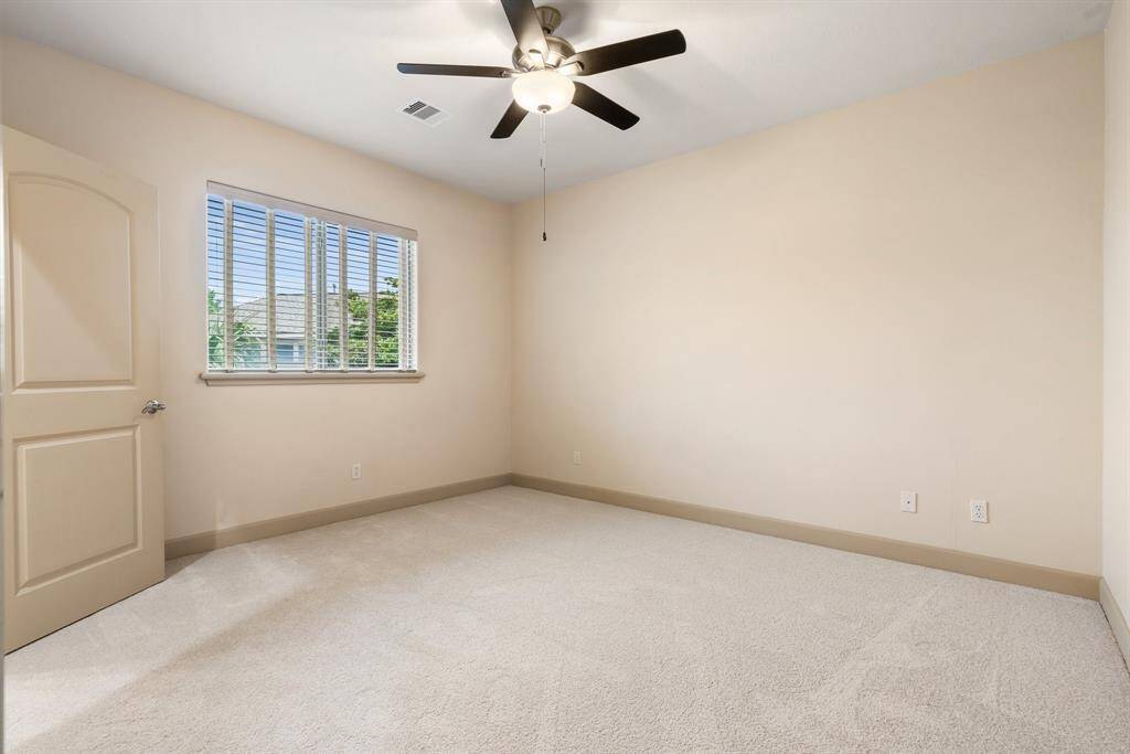 The second bedroom upstairs also with brand new carpeting.