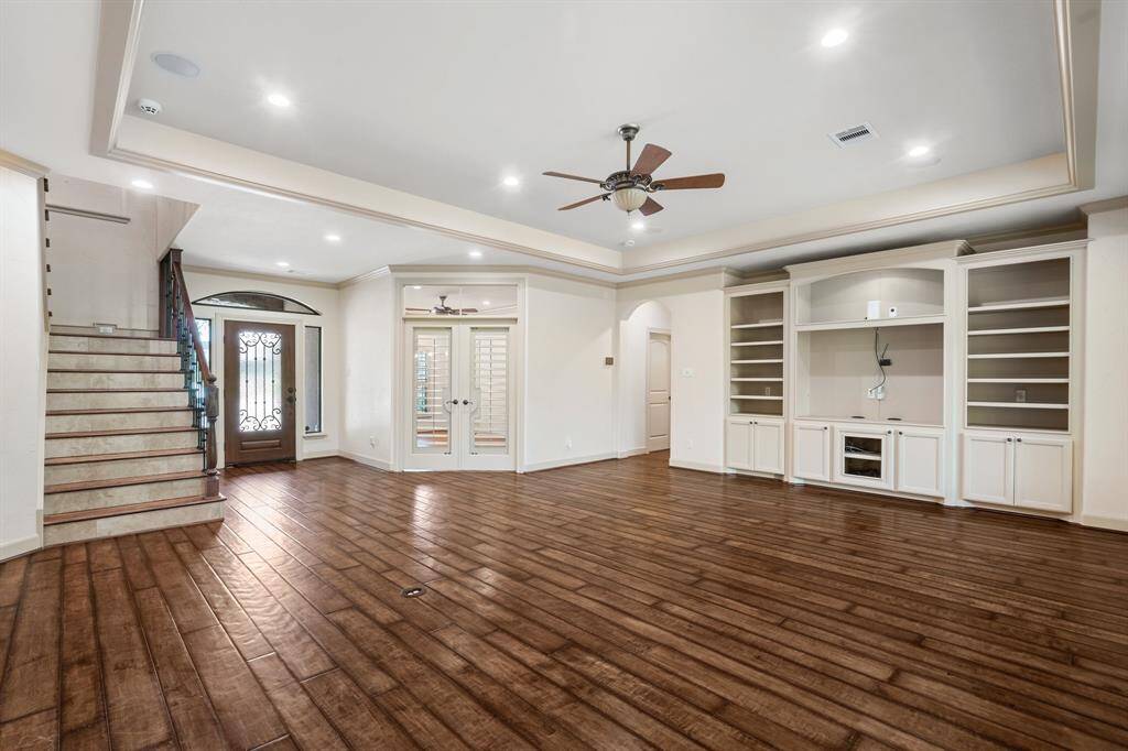 Great Room has a built-in entertainment center with lots of storage.