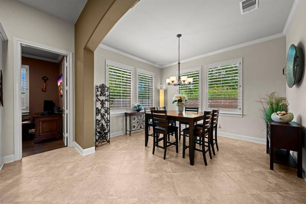 Flex room is off the kitchen and breakfast area