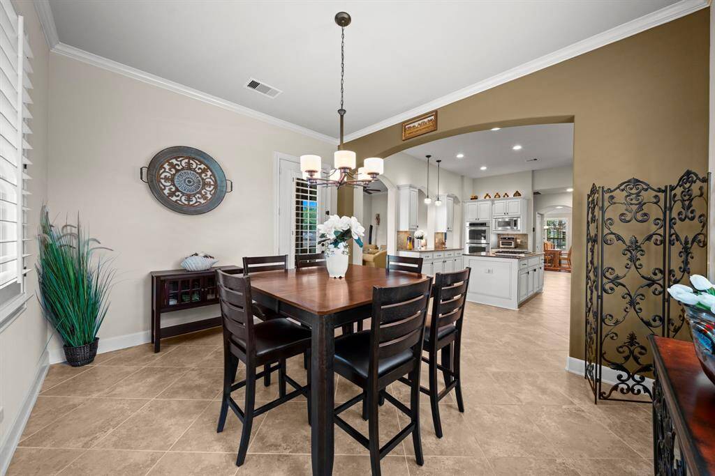 Breakfast room is open to the kitchen and den