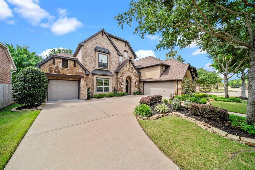 Split 3 car garage with plenty of extra parking for guests