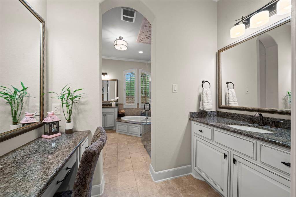 Her vanity area with separate sink and vanity counters