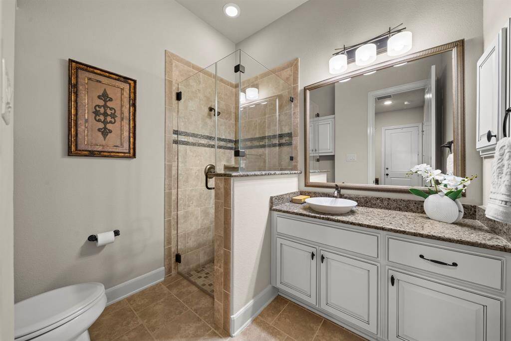 Second full bath downstairs for the guest suite