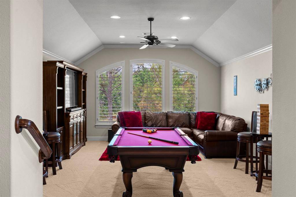 ENORMOUS game room upstairs provides all the entertainment room you could need