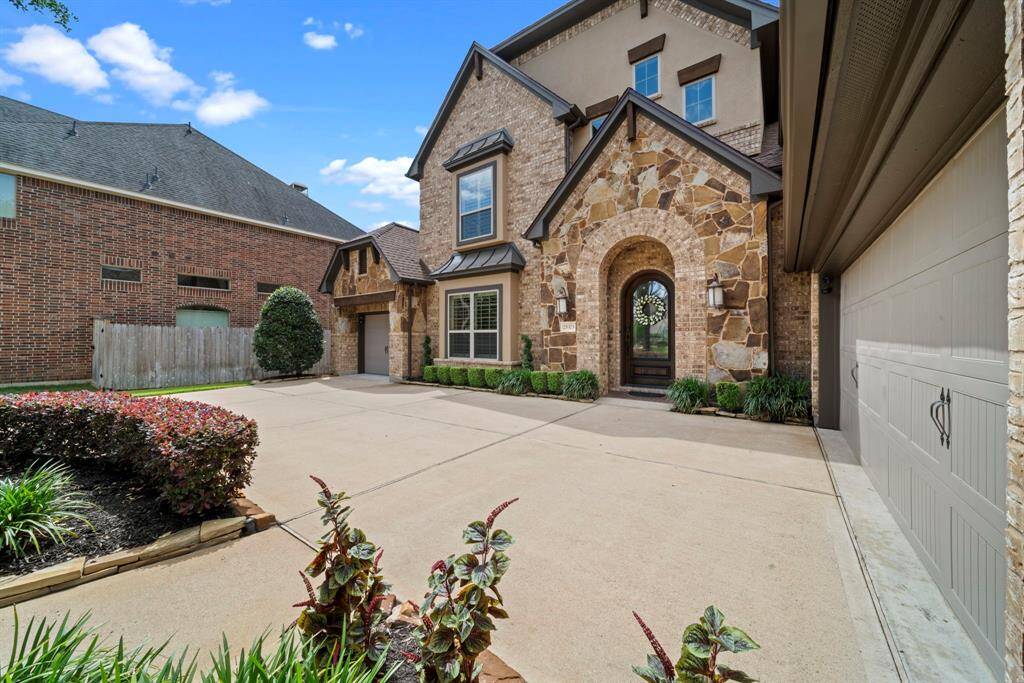 Stone and stucco exterior provide warm curb appeal