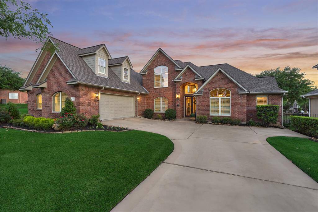 Stunning custom-built home on premium golf course lot in the coveted community of Bentwater.