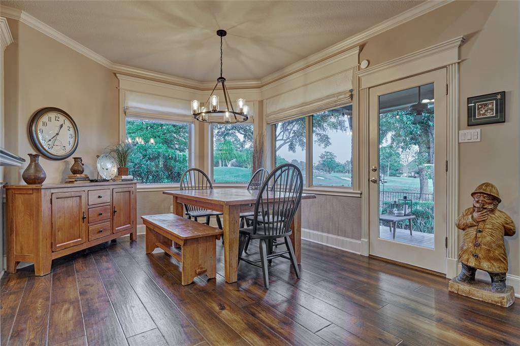 The breakfast area is flooded with natural light and enjoys tranquil views of the back yard.