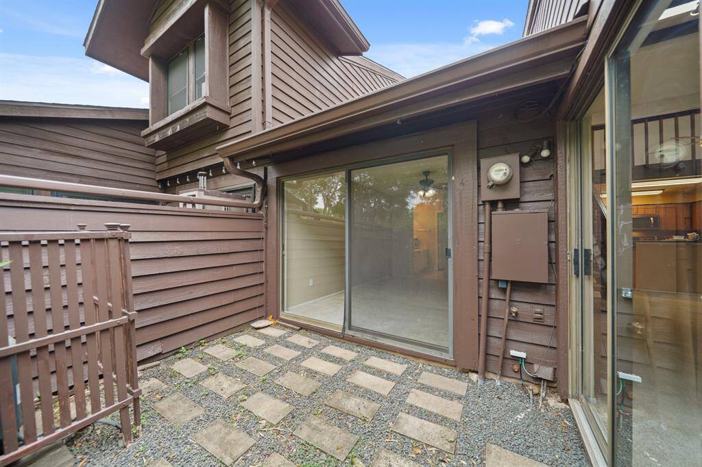 Ideal for outdoor cooking & dining, this beautiful patio offers convenient access to the kitchen.