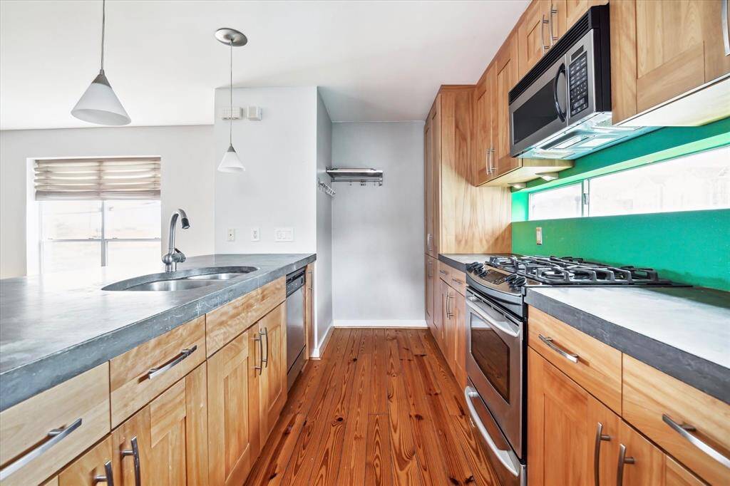 Pendant lighting and a gas range