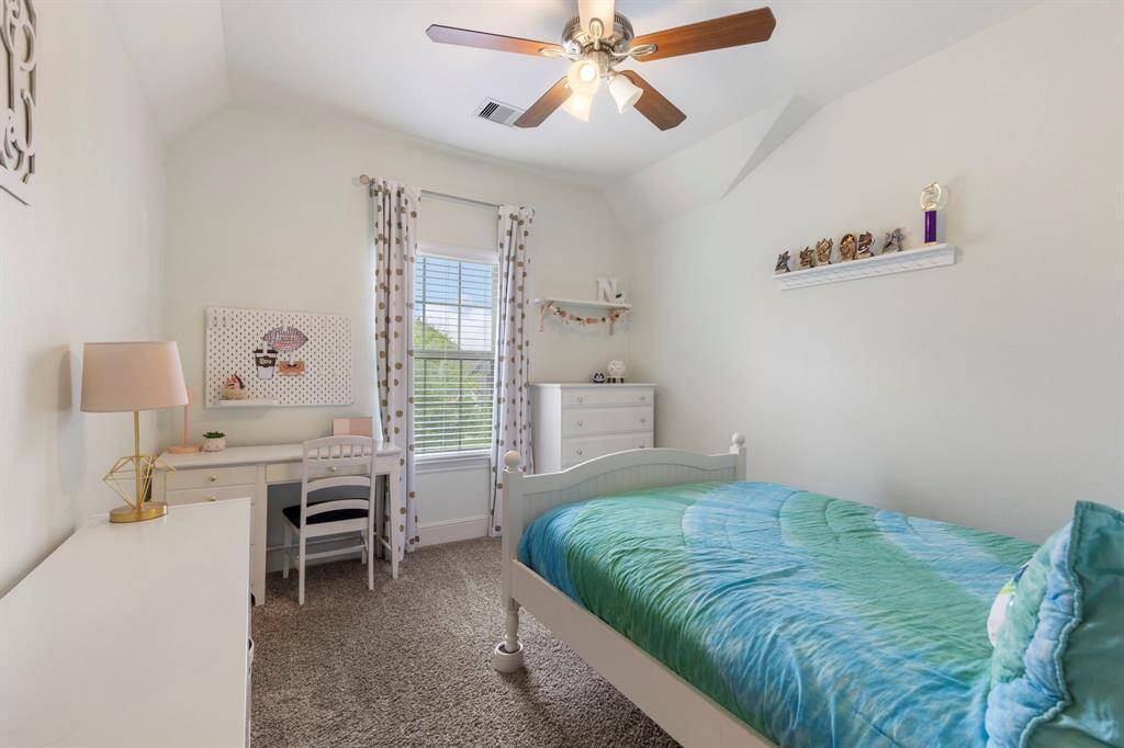 All bedrooms feature neutral paint and carpet.