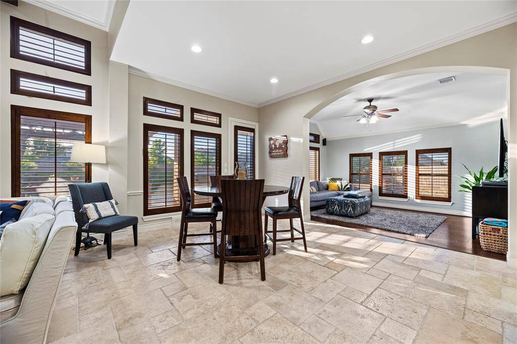 The breakfast area, conveniently located next to the kitchen and living room, offers plenty of space for a large table—perfect for family meals and gatherings!