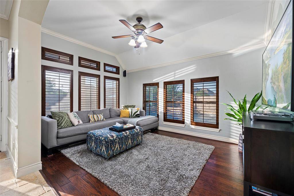 The game room just off the main living area is the perfect spot for family movie nights, game days, or simply unwinding together. With its comfortable layout and seamless flow, it offers a warm, inviting retreat for quality time and relaxation.