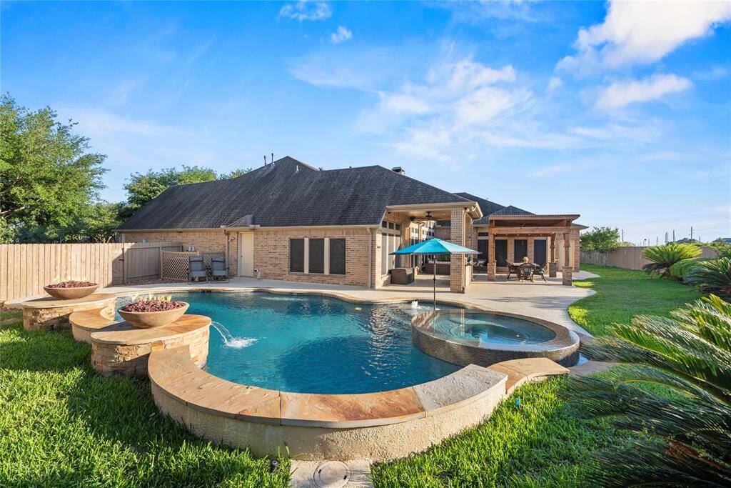 Get ready to dive into your own slice of paradise! Splash, sizzle, and relax in your private oasis. Your dream home awaits!