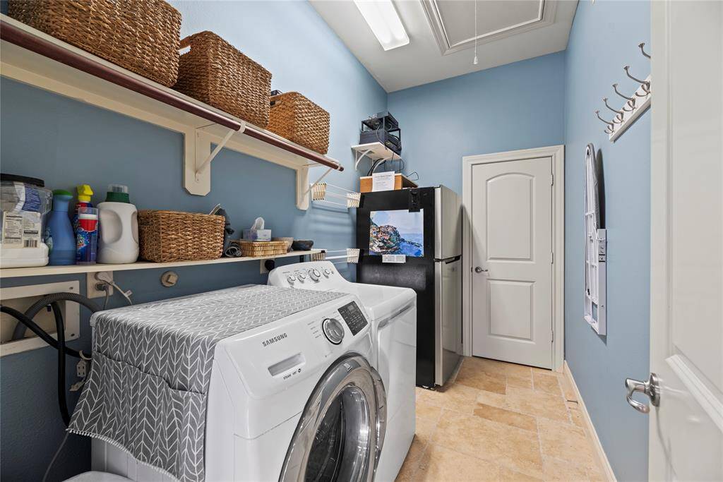 This well-appointed space includes ample storage and efficient organization, making laundry day a breeze while keeping your home tidy and functional.
