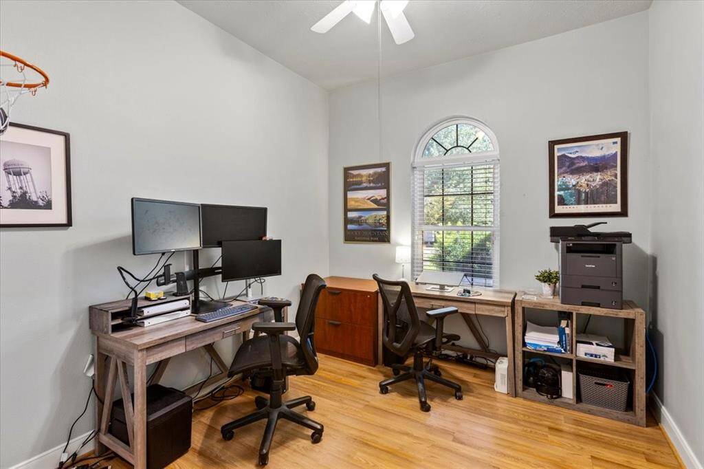 This versatile secondary bedroom is currently utilized as a spacious office but has the potential to be an amazing bedroom as well. With ample natural light and generous dimensions, it effortlessly adapts to your needs, making it ideal for work or rest.