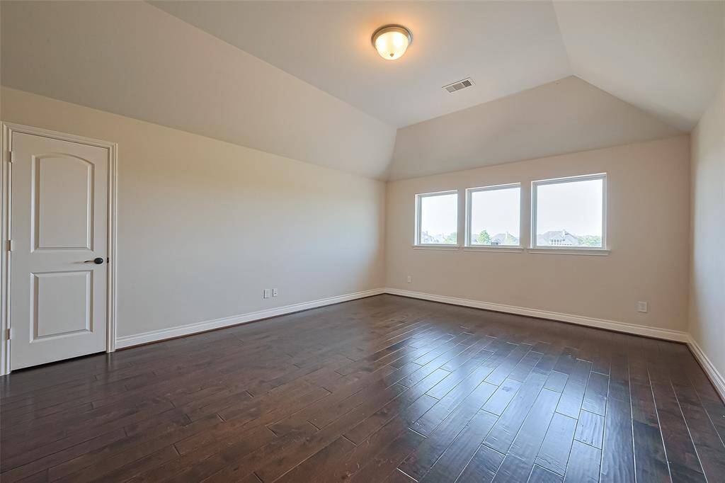 Upstairs gameroom with that beautiful VIEW of the lake.  No carpet anywhere!