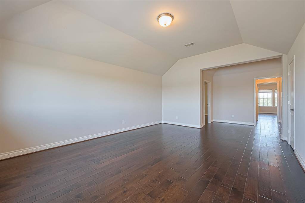 Just outside of the gameroom, there is a bonus room that can be used as an office or media room.