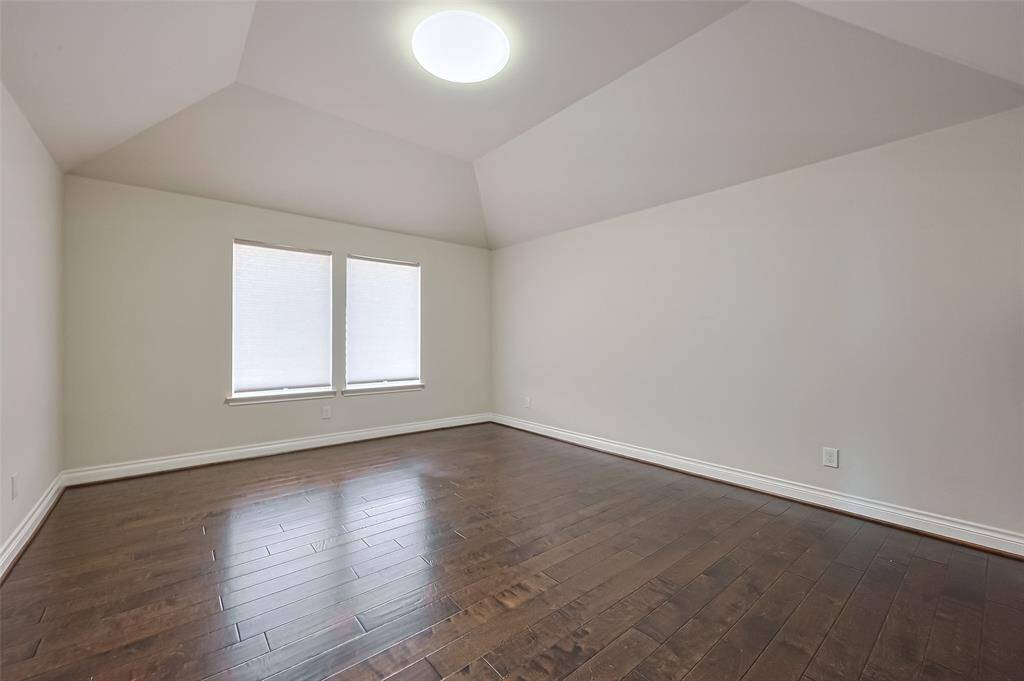 The bonus room has plenty of natural light and could be used as a home office or fitness room.  Add blackout curtains and you have a media room!