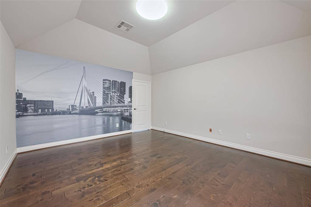 The bonus room has plenty of natural light and could be used as a home office or fitness room.  Add blackout curtains and you have a media room!