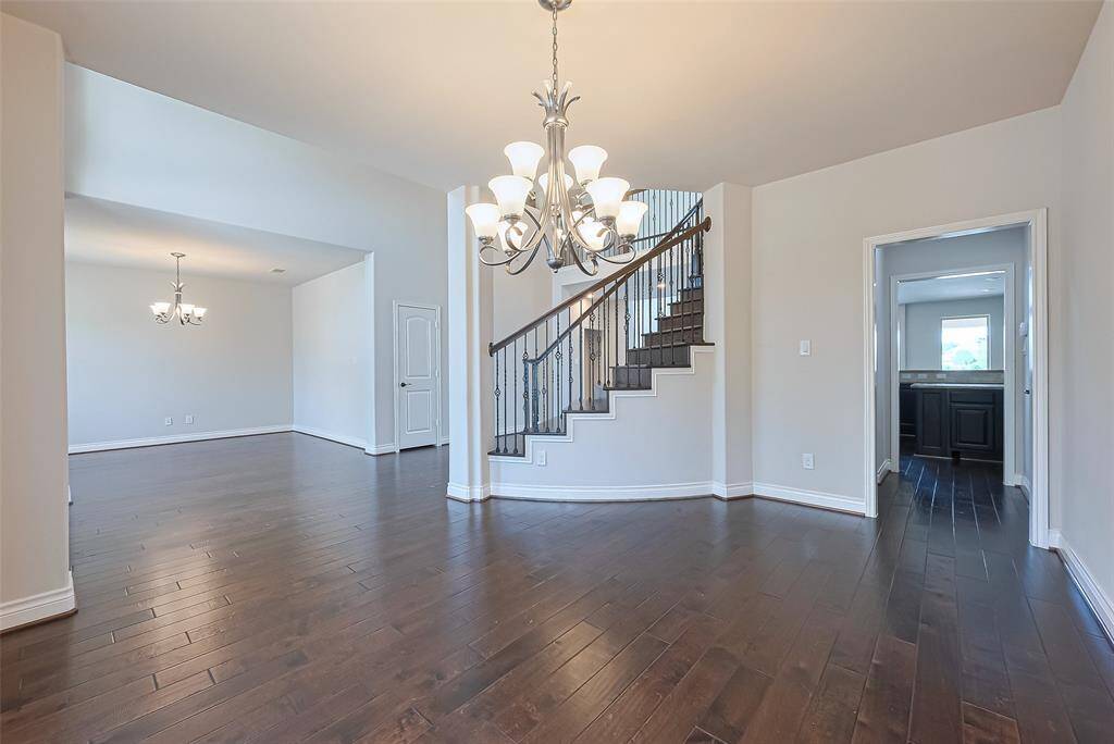 The formal dining room has direct access to the kitchen and the butler's pantry.