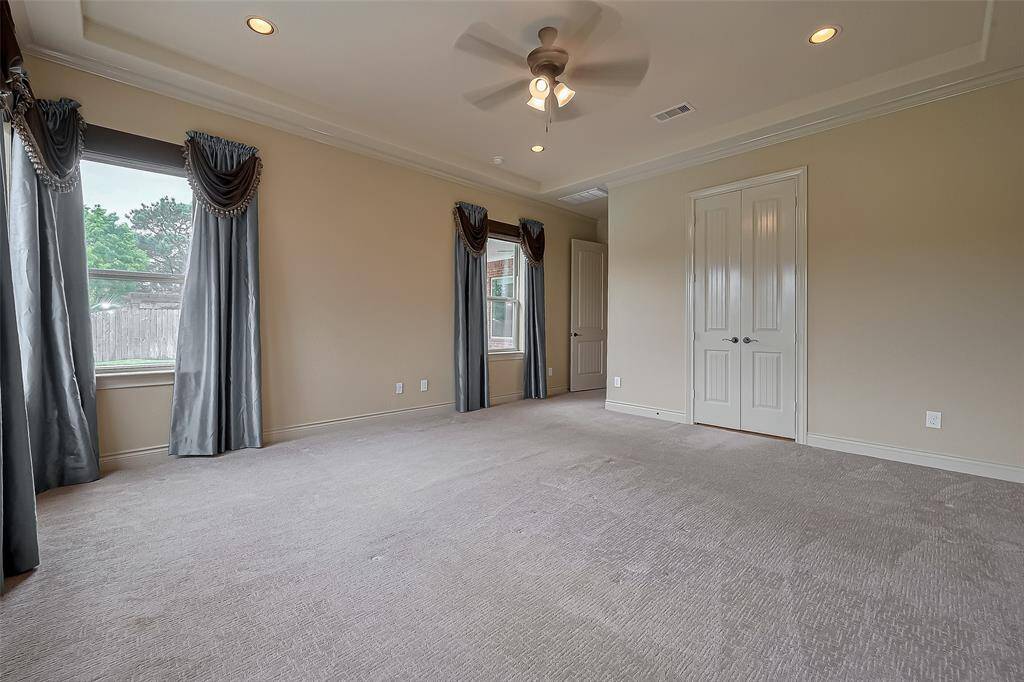 Lots of Room in Primary Bath, two vanities with granite counter tops & lots of storage in cabinets.