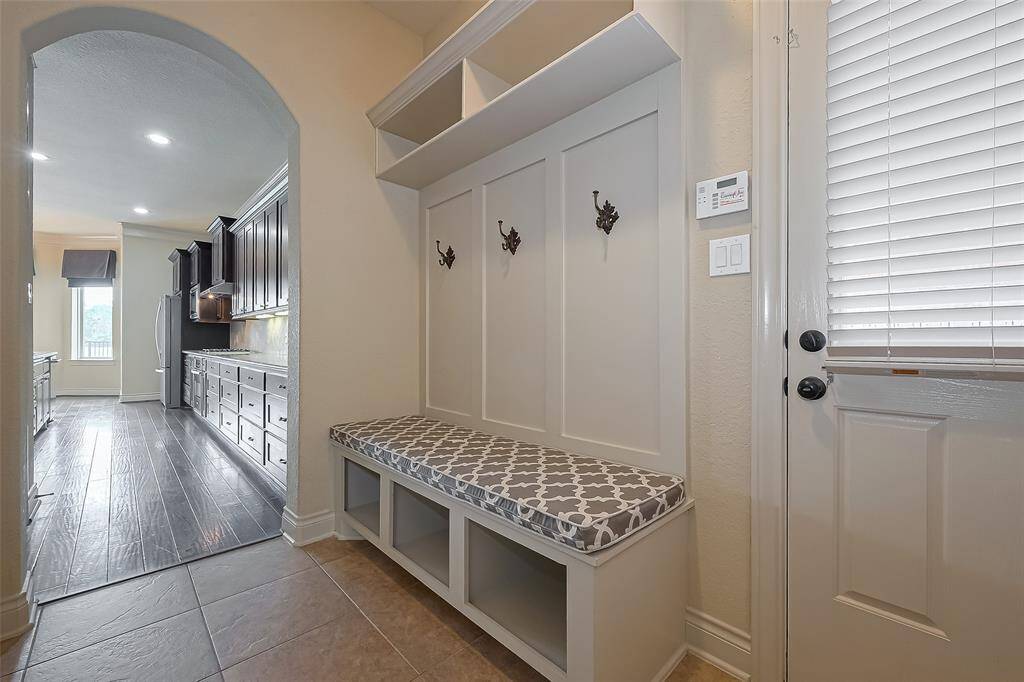 Half Bath by garage door.