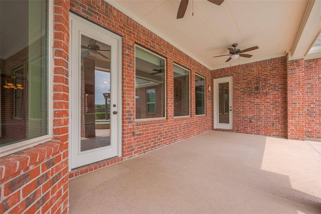Covered Patio with 2 New Ceiling Fans.