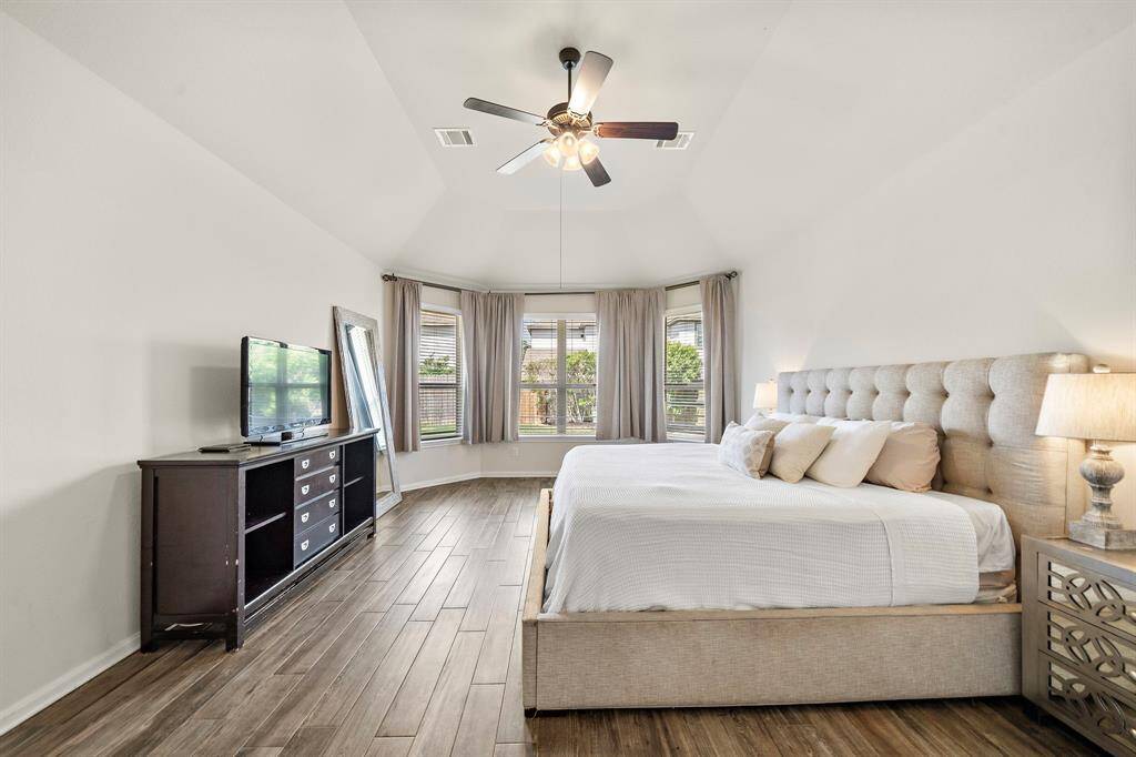 Another view of the primary bedroom.