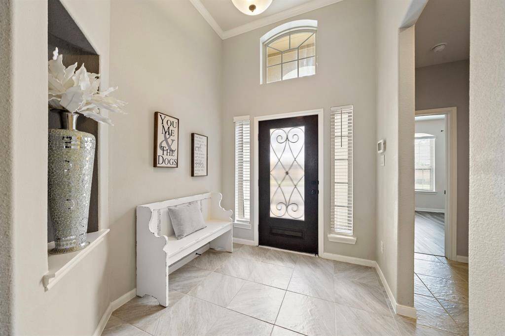 View looking back at the front door and foyer area.