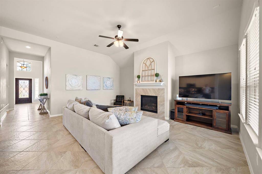 Wide open hallway leads to the heart of the home, the living room and kitchen areas.