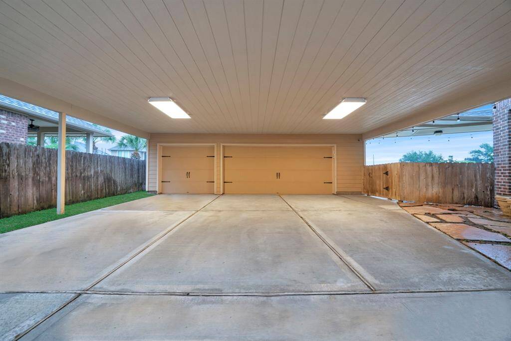 Amazing covered patio leads to 3 car garage!