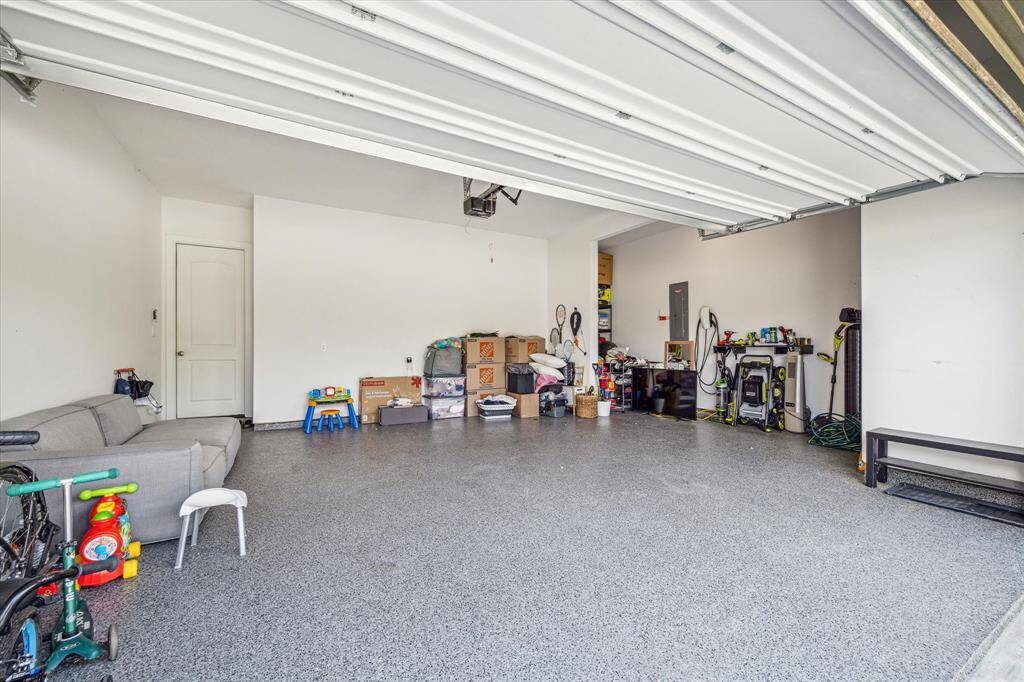 notice epoxy floors in garage AND whole home water softener in garage